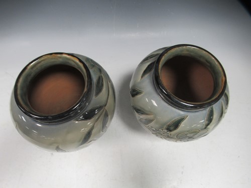 Lot 18 - A pair of Doulton stoneware vases, 24cm high