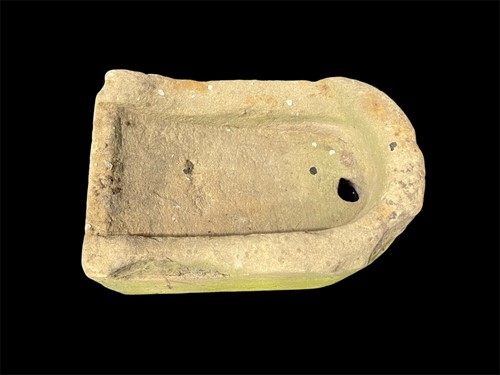 Lot 795 - A bow fronted carved stone sink or garden...