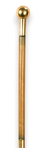 Lot 76 - A gold coloured rhino horn riding crop, circa 1915