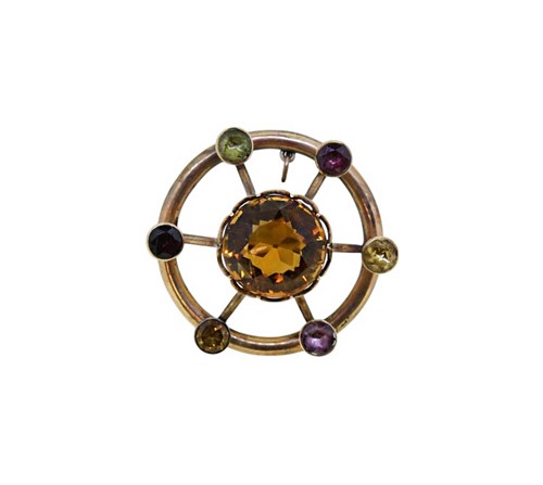 Lot 63 - A gemset brooch