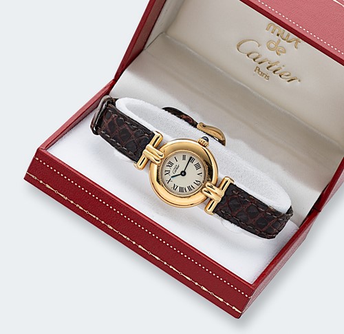Lot 240 - Cartier - A vermeil 'Les Must de Cartier Colisée' wristwatch