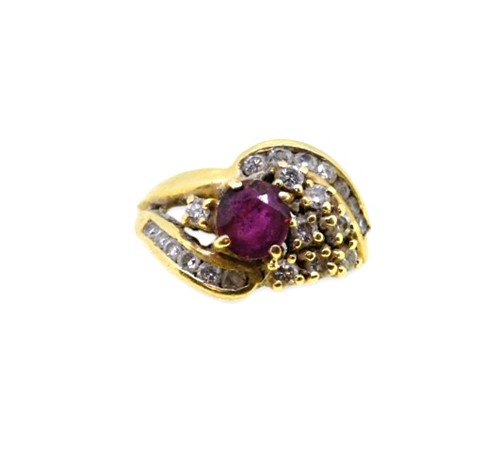 Lot 67 - A ruby and diamond cluster ring