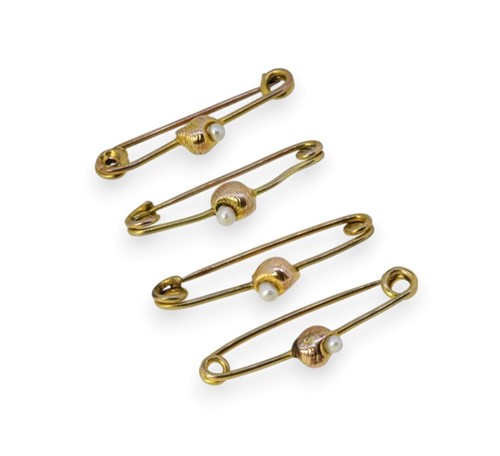 Lot 5 - A cased set of four seed pearl brooches
