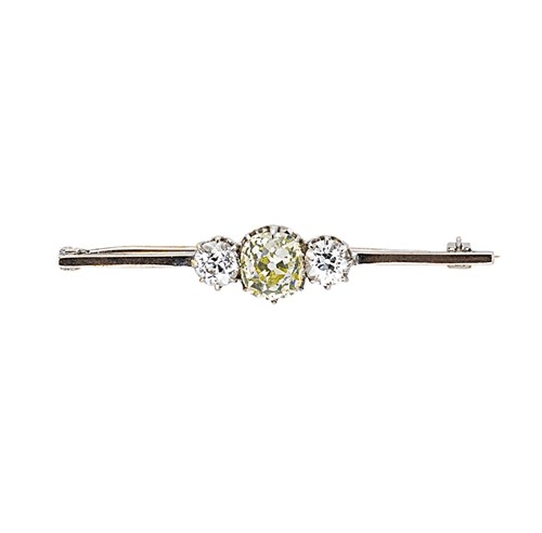 Lot 163 - A three stone diamond bar brooch