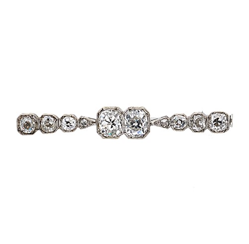 Lot 161 - A diamond set bar brooch