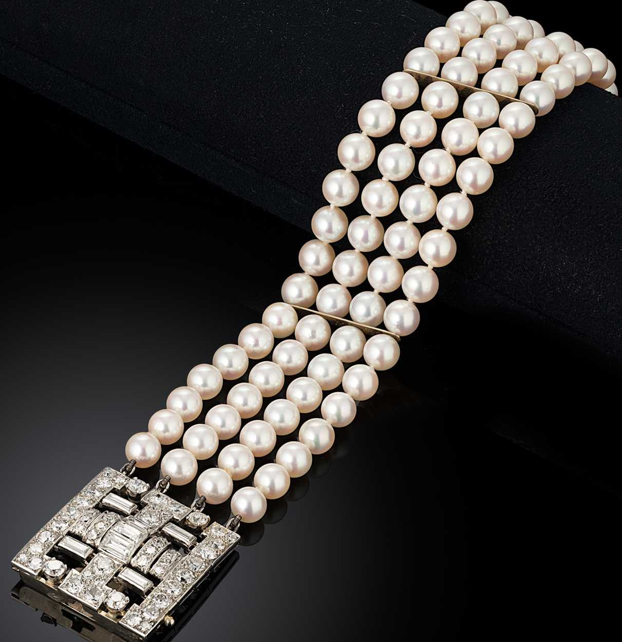Lot 190 - An early 20th century cultured pearl and diamond bracelet