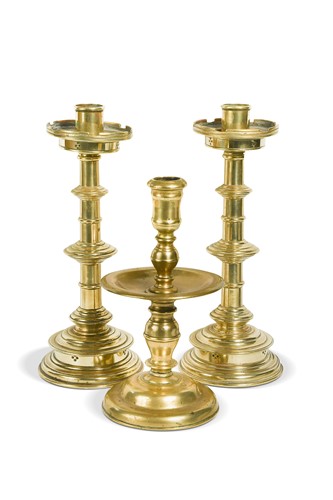 Lot 390 - A pair brass table candlesticks,18th century