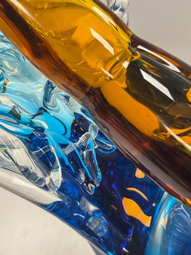 Lot 16 - A Murano glass two-part sculpture of a figure diving through a wave