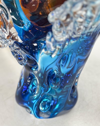 Lot 16 - A Murano glass two-part sculpture of a figure diving through a wave