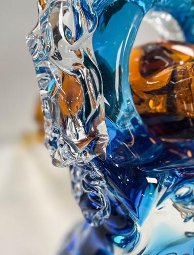 Lot 16 - A Murano glass two-part sculpture of a figure diving through a wave