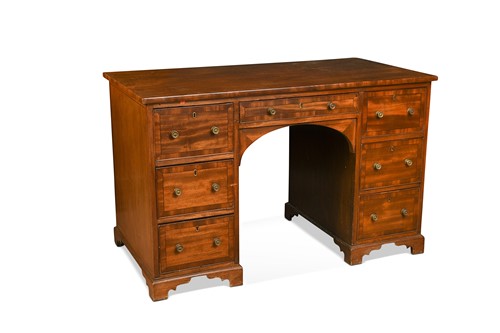 Lot 633 - A mahogany knee hole desk, early 19th century
