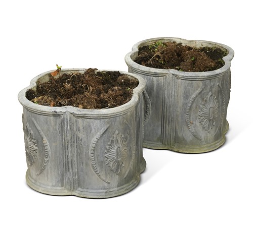Lot 737 - A pair of small lead planters, 20th century