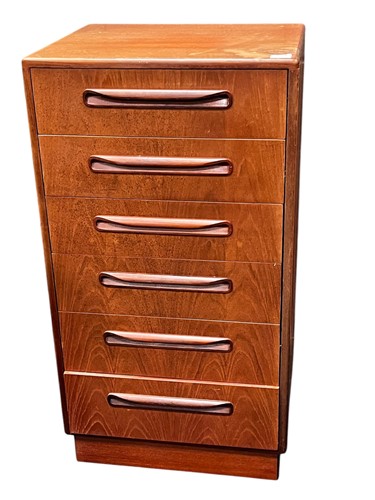 Lot 665 - A G-Plan teak chest, the six drawers with...