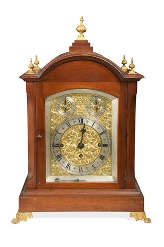 Lot 629 - An Edwardian mahogany chiming three train table clock