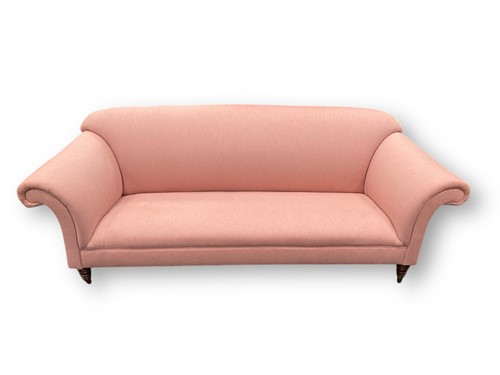 Lot 595 - A 20th century sofa on ring turned tapering...