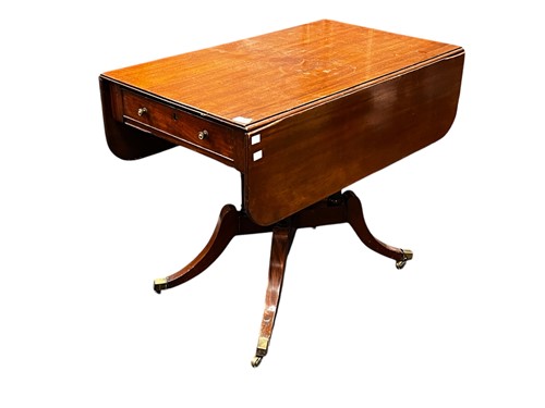 Lot 659 - A Regency mahogany Pembroke table, on four...