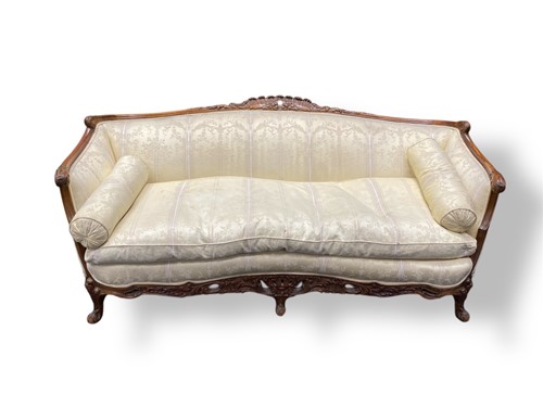 Lot 658 - A 19th century Continental carved walnut three...
