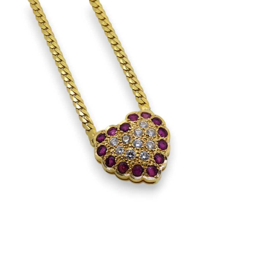 Lot 94 - An 18ct gold ruby and diamond heart necklace