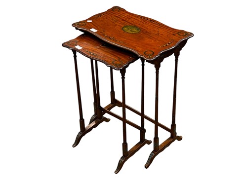 Lot 697 - An Edwardian satinwood nest of two tables, the...