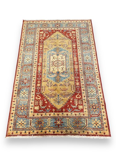 Lot 770 - A modern Kazak rug, 209 x 140cm
