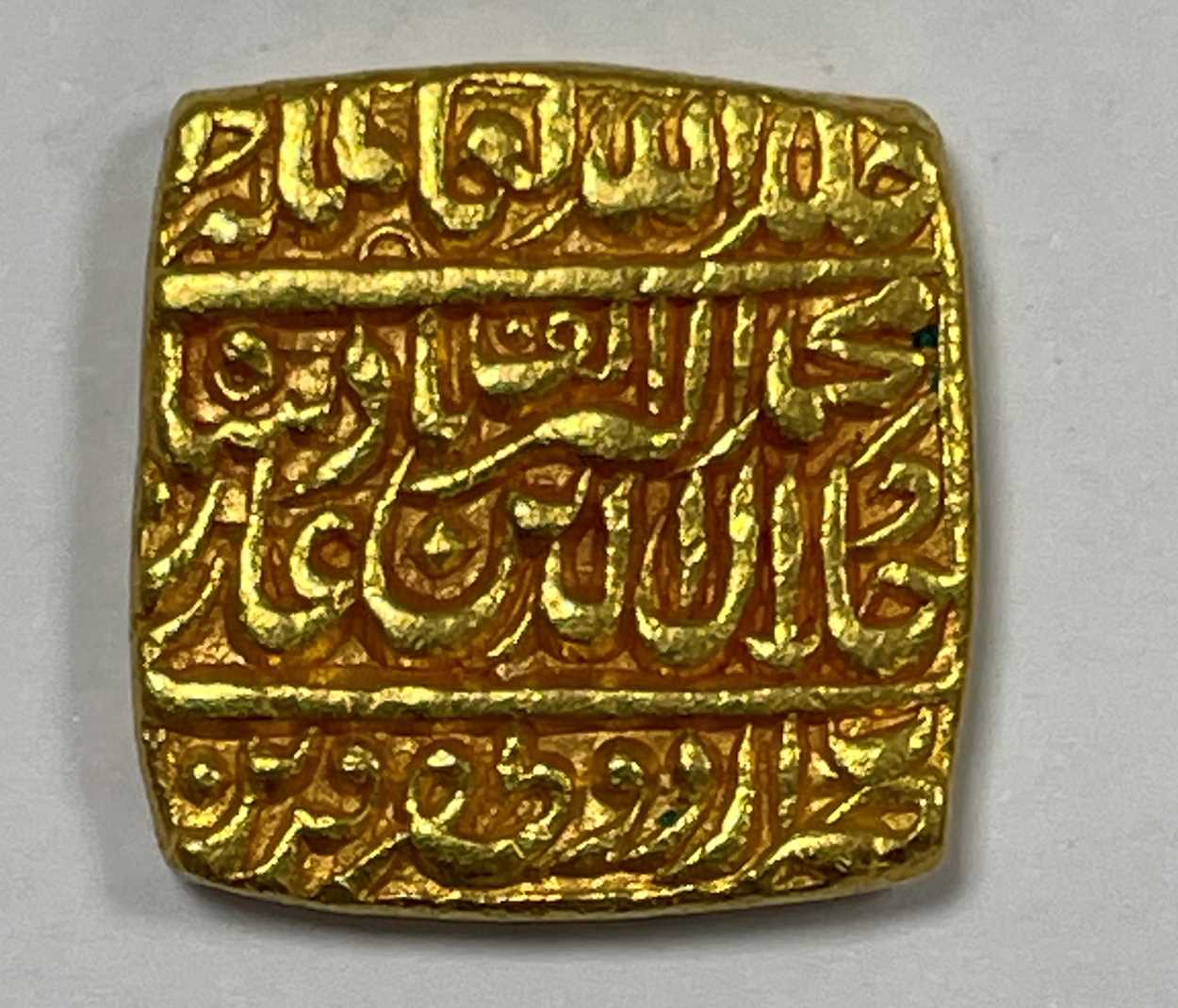 Mohur Lot 187 - An Akbar Gold Square Mohur Coin,