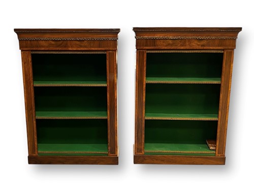 Lot 718 - A pair of mahogany open bookcases (adapted),...