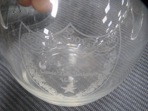 Lot 144 - A modern Dom Perignon engraved glass ice...