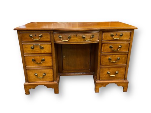 Lot 702 - A reproduction Regency style mahogany dressing...