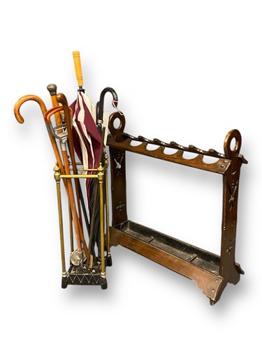 Lot 734 - An Edwardian brass stick stand with four...