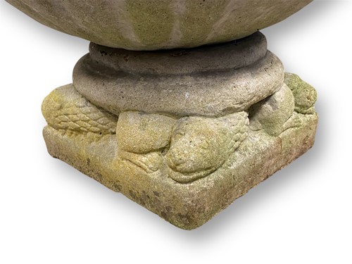Lot 793 - A pair of composite stone garden planters, the...