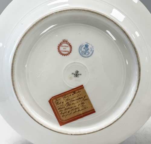 Lot 494 - A pair of Sevres Louis Philippe Sevres Chateau des Tuileries porcelain plates, 19th century