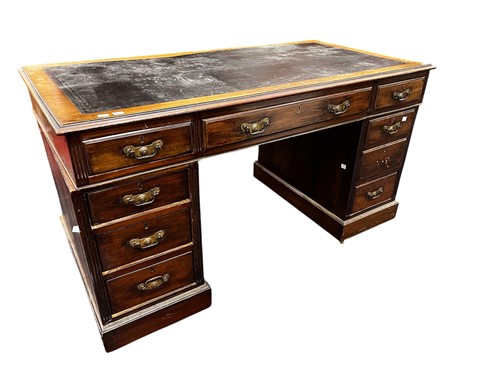 Lot 596 - An early 20th century pedestal desk, the top...