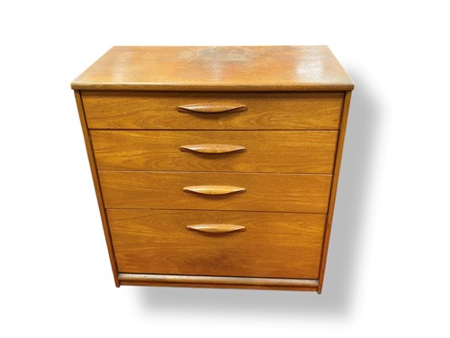 Lot 717 - A mid century teak chest of drawers by...