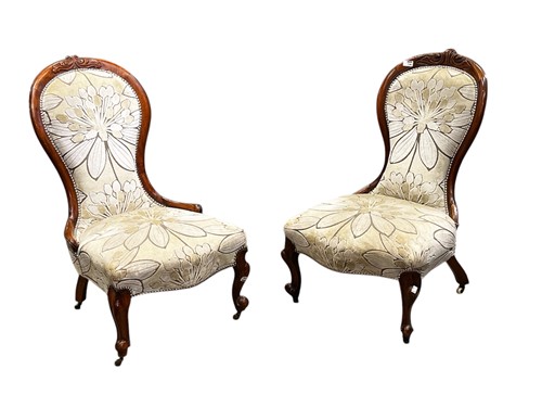 Lot 738 - A matched pair of Victorian walnut spoonback...