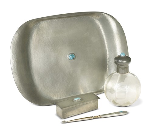Lot 128 - A Liberty Tudric pewter dressing table part set