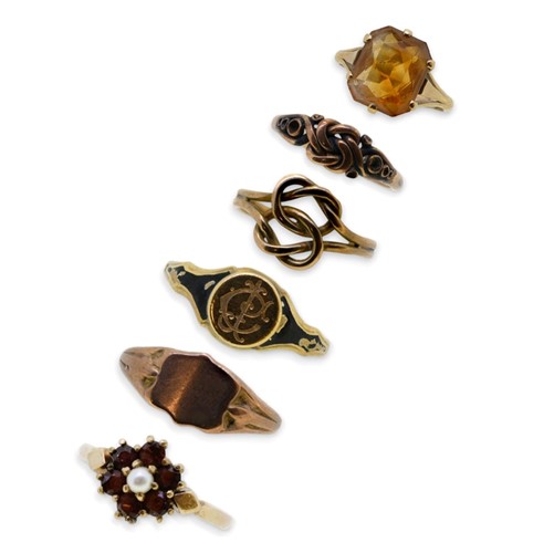 Lot 392 - A collection of six dress rings, hallmarked or...