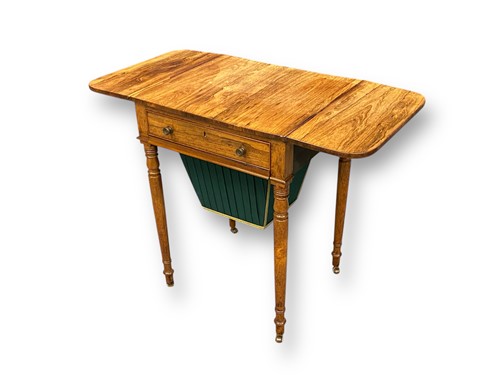 Lot 719 - A William IV rosewood work / lamp table, the...