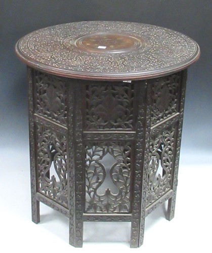 Lot 748 - An Indian carved wood occasional table, circa...
