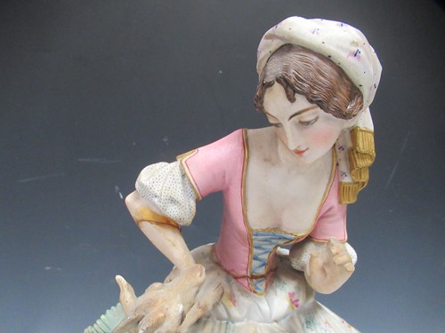 Lot 147 - A 19th century bisque porcelain figural clock,...
