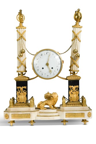 Lot 661 - A Louis XVI style white marble and gilt metal mounted mantel clock