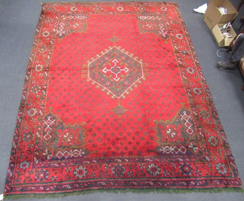 Lot 783 - Turkish Ushak or Oushak rug in red, black,...