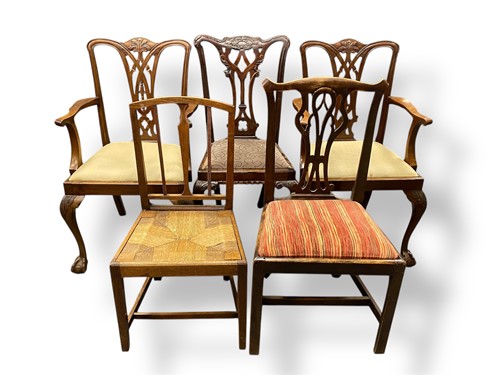Lot 566 - A pair of George III style mahogany elbow...
