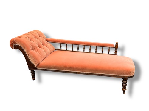 Lot 694 - An Edwardian oak frame chaise longue, with...