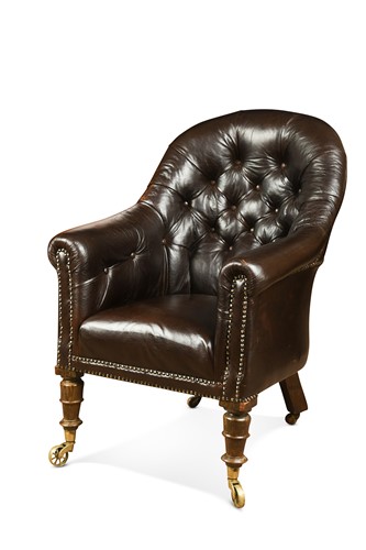 Lot 558 - A Victorian leather button back library armchair