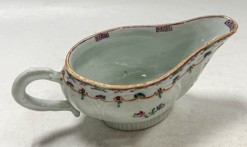 Lot 14 - Two Chinese famille rose sauceboats, Qianlong, circa 1780