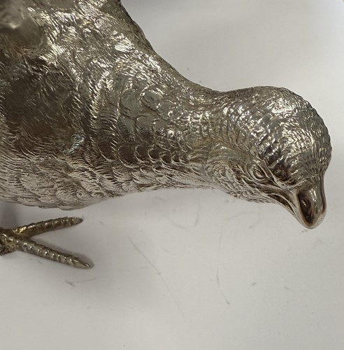 Lot 272 - A pair of Elizabeth II silver table ornaments modelled as pheasants