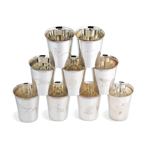 Lot 569 - A set of 9 Elizabeth II silver beakers