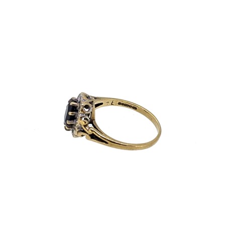 Lot 9 - A sapphire and diamond cluster ring