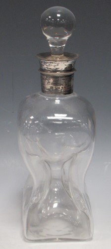 Lot 32 - A Victorian silver mounted 'glug-glug' decanter