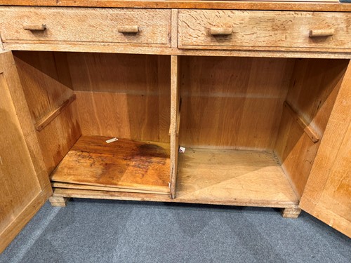 Lot 209 - A Heal's limed oak bookcase or dresser, circa 1930
